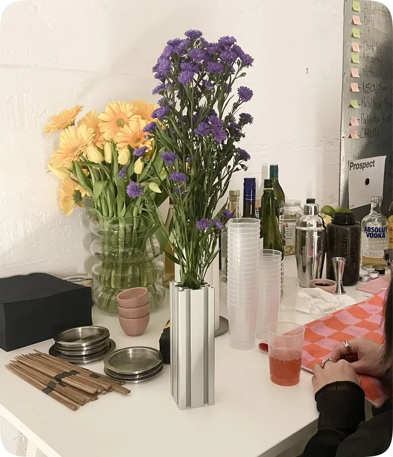 Type 660 vase with yellow and purple flowers in a kitchen