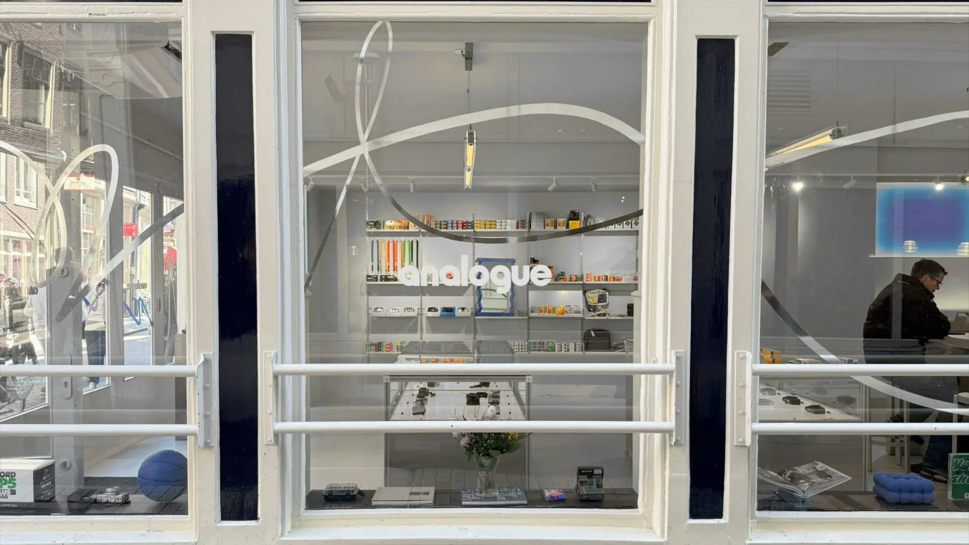 Shop window with the Analogue logo and vitrines inside, Analogue store Zeedijk
