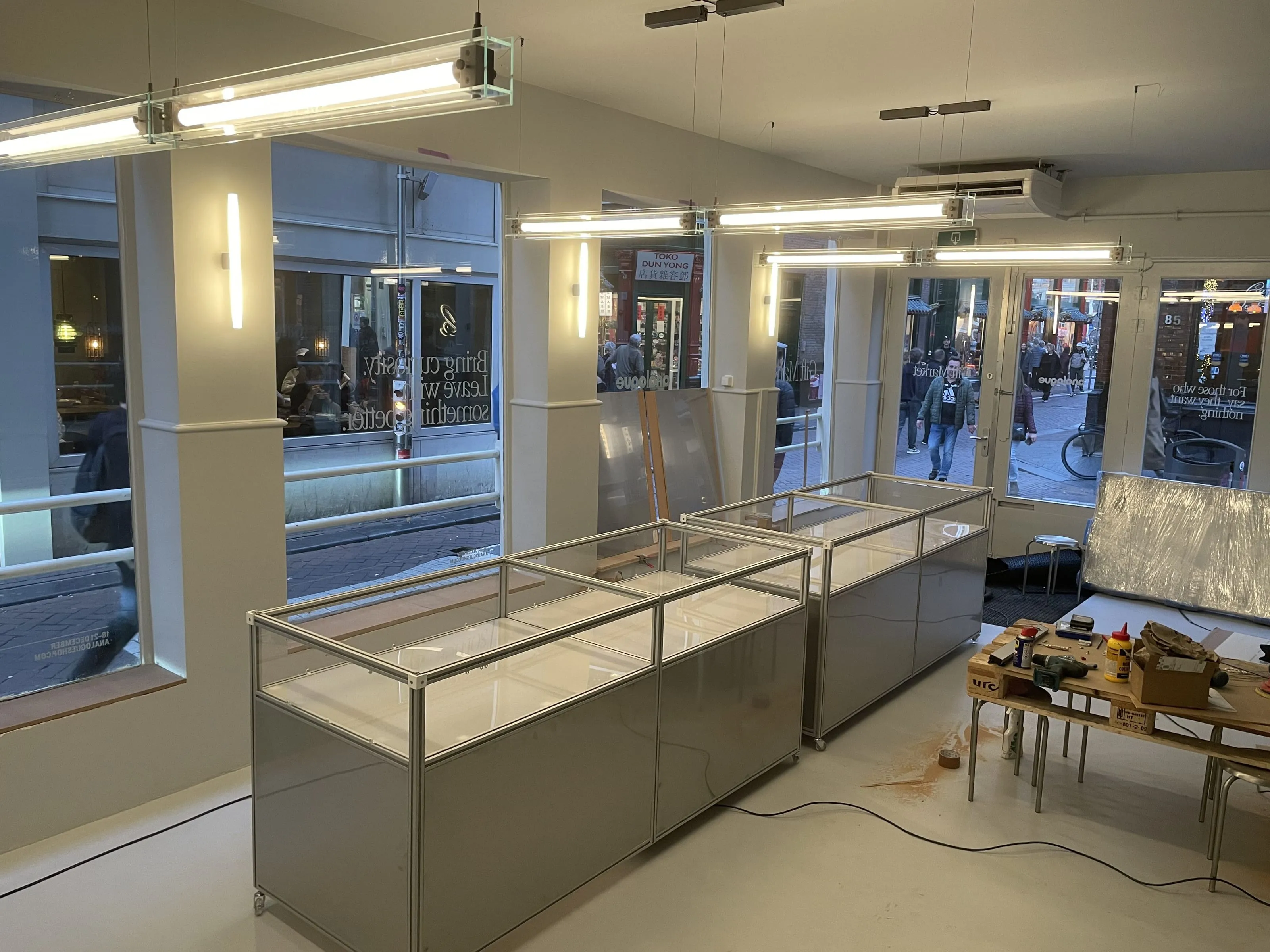 Shop interior during the build with vitrines and tools, Analogue store Zeedijk